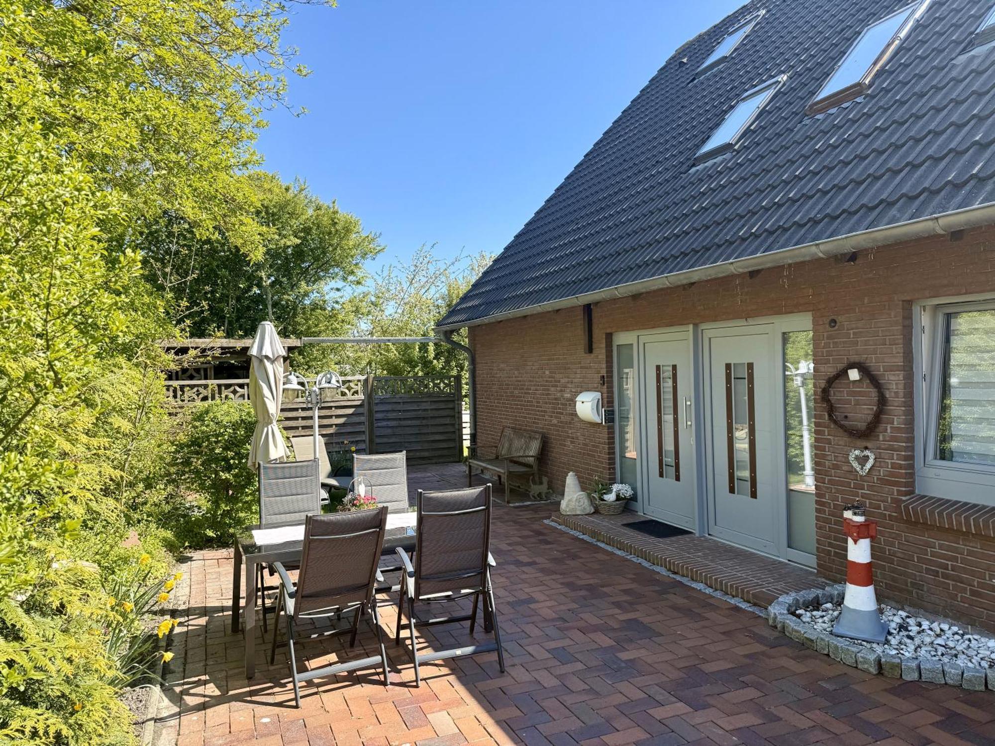 Ferienhaus Blinkfuer Neuharlingersiel Extérieur photo